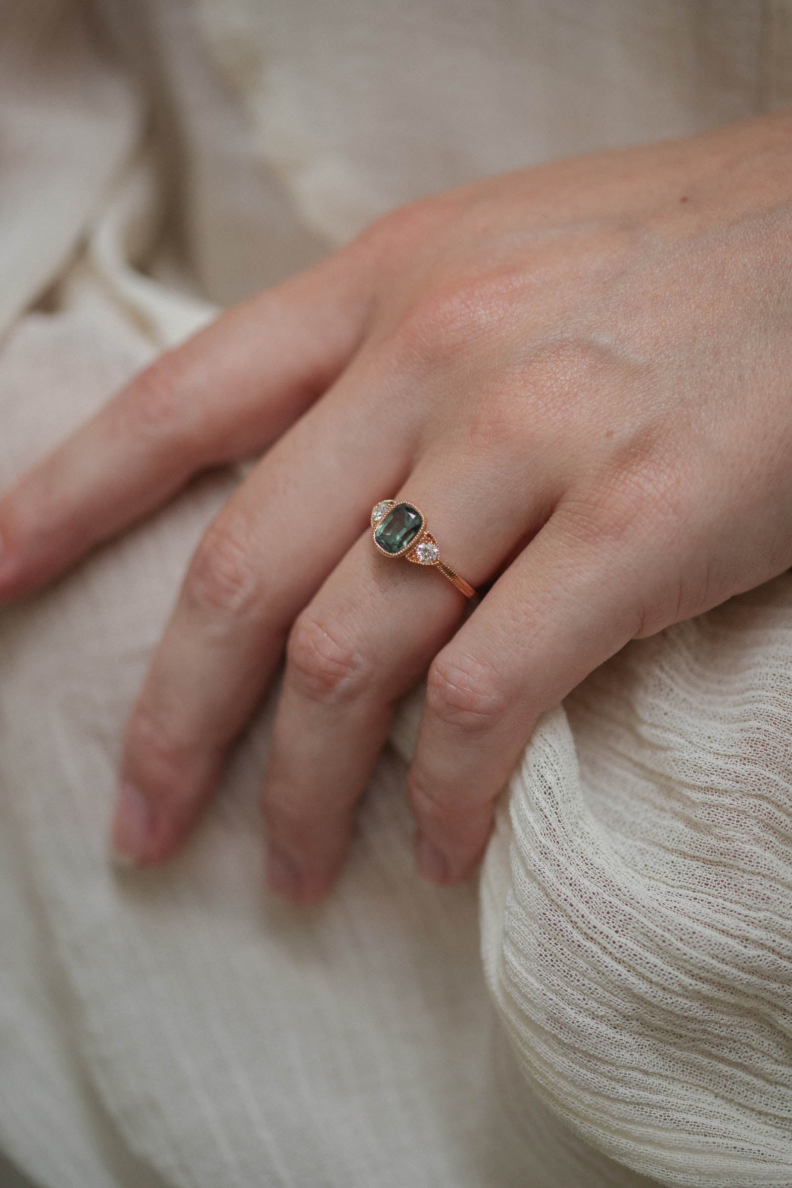 Designer engagement ring in gold with sapphire and diamonds Myrtille Beck Paris