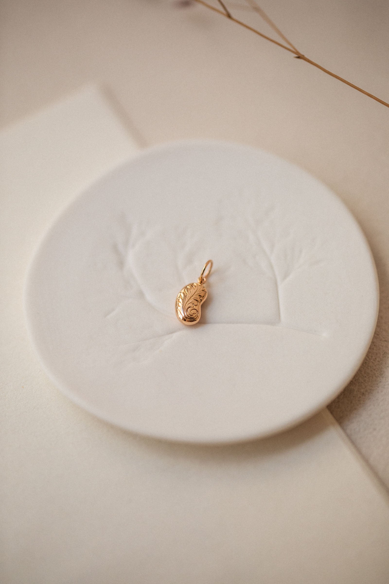 Symbolic designer jewelry gold pendant Myrtille Beck Paris