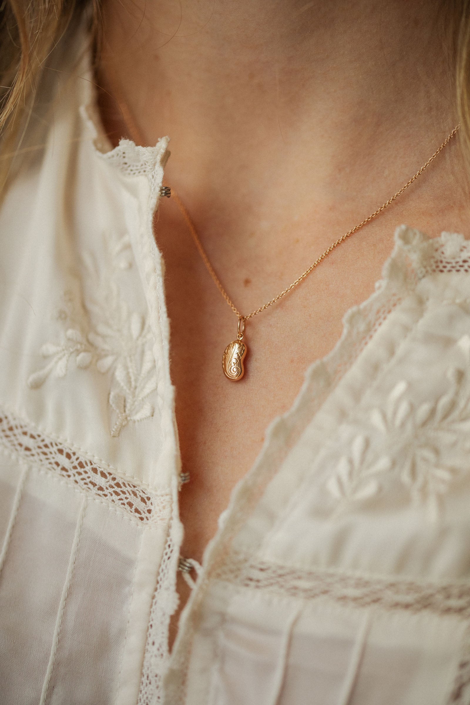 Symbolic designer jewelry gold pendant Myrtille Beck Paris