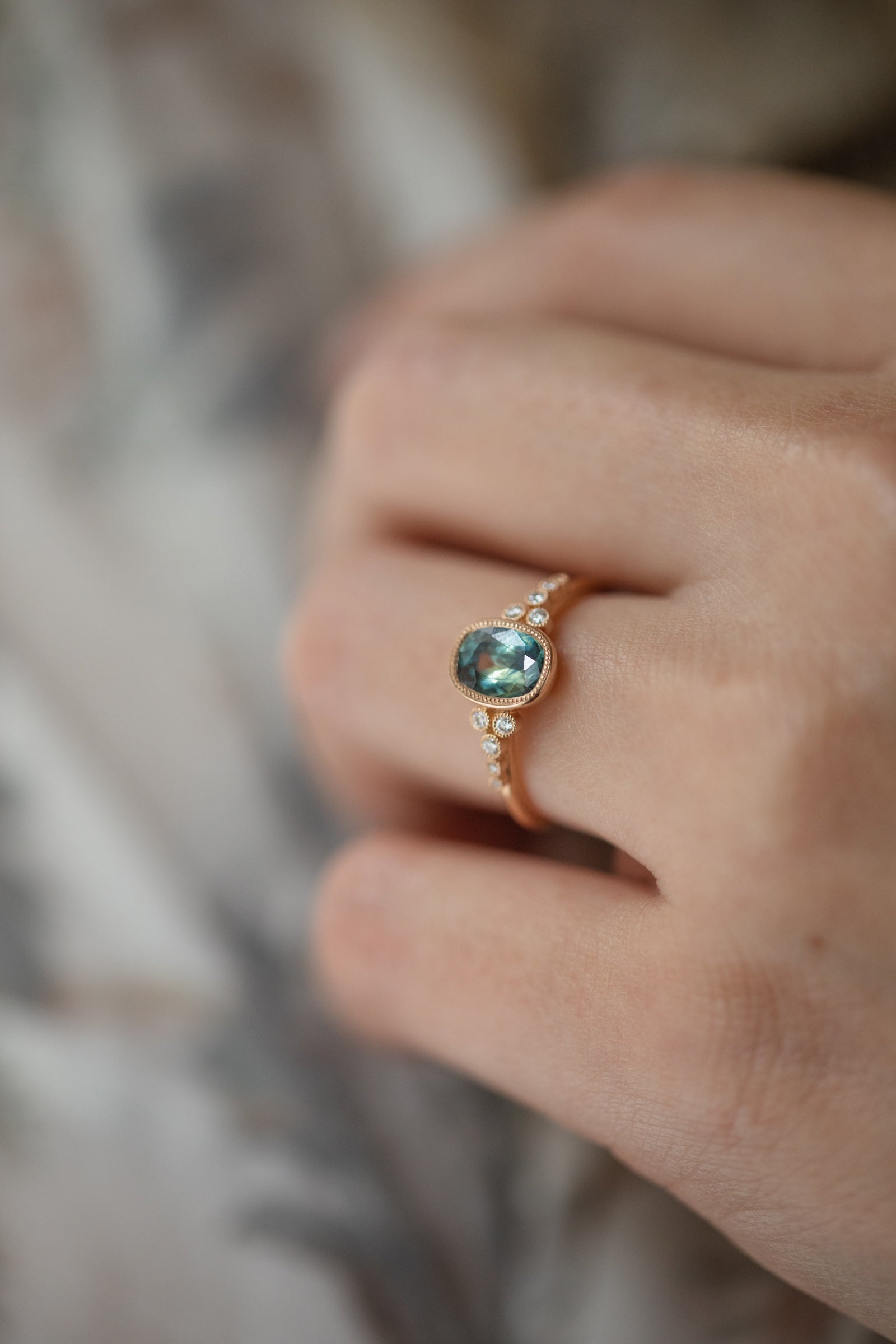 Designer engagement ring Unique piece in gold with natural blue-green umba sapphire and brilliant white diamonds Myrtille Beck
