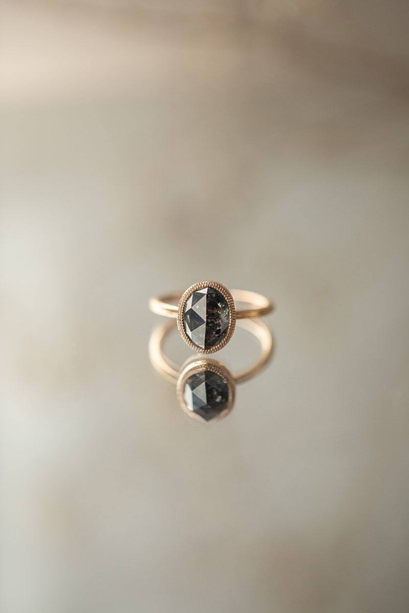 Designer engagement ring: One-of-a-kind piece in gold with diamond oval rose-cut diamond and pepper" diamond , " Myrtille Beck