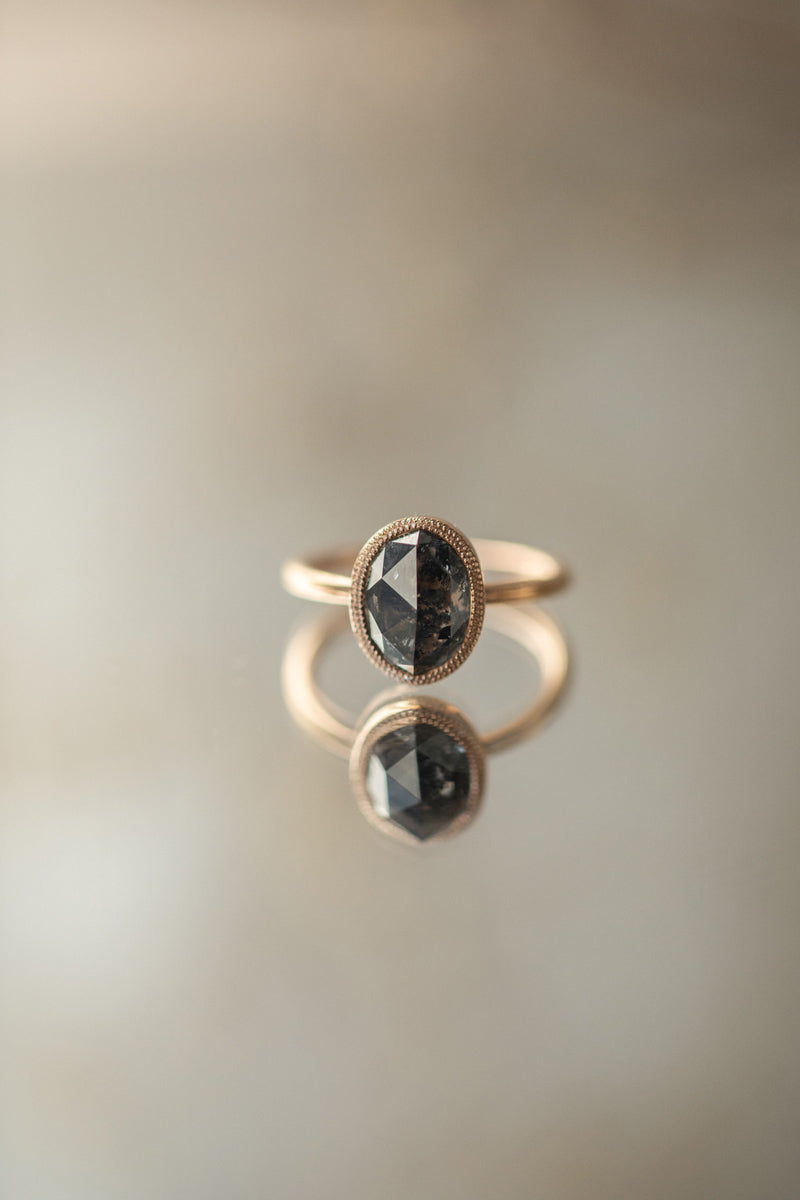 Designer engagement ring: One-of-a-kind piece in gold with diamond oval rose-cut diamond and pepper" diamond , " Myrtille Beck