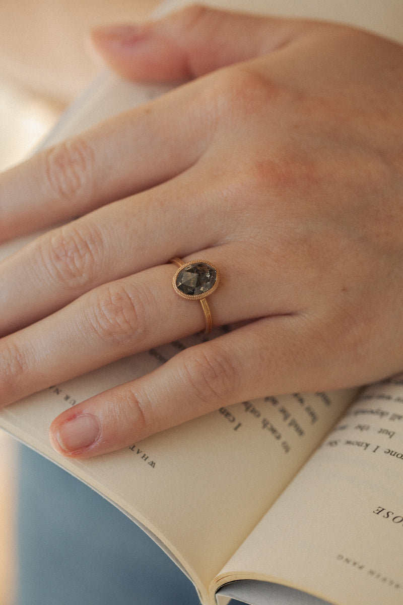 Designer engagement ring: One-of-a-kind piece in gold with diamond oval rose-cut diamond and pepper" diamond , " Myrtille Beck