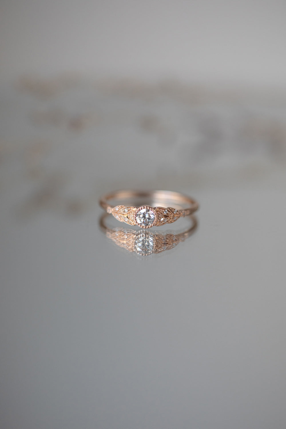 Designer engagement ring in gold with brilliant white diamonds by Myrtille Beck