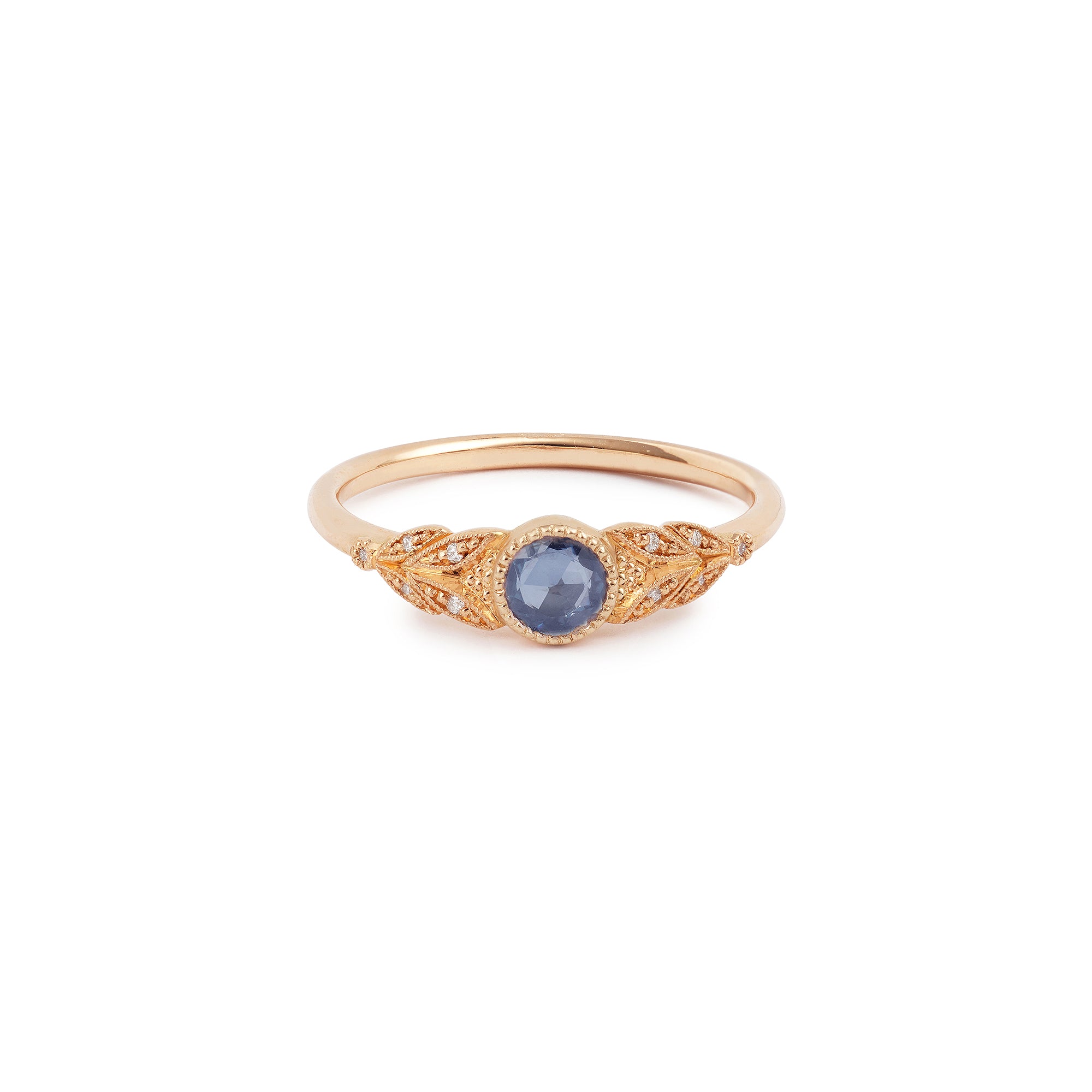 Designer engagement ring in gold with rose-cut blue sapphire by Myrtille Beck