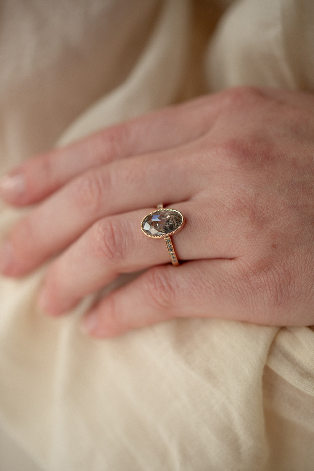 Designer engagement ring: One-of-a-kind piece in gold with diamond oval diamond by Myrtille Beck