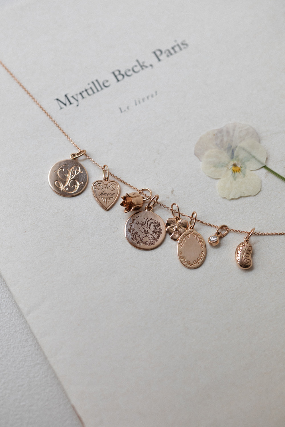 Designer jewelry, gold charm pendant for a birth or baptism, symbolic gold jewelry by Myrtille Beck