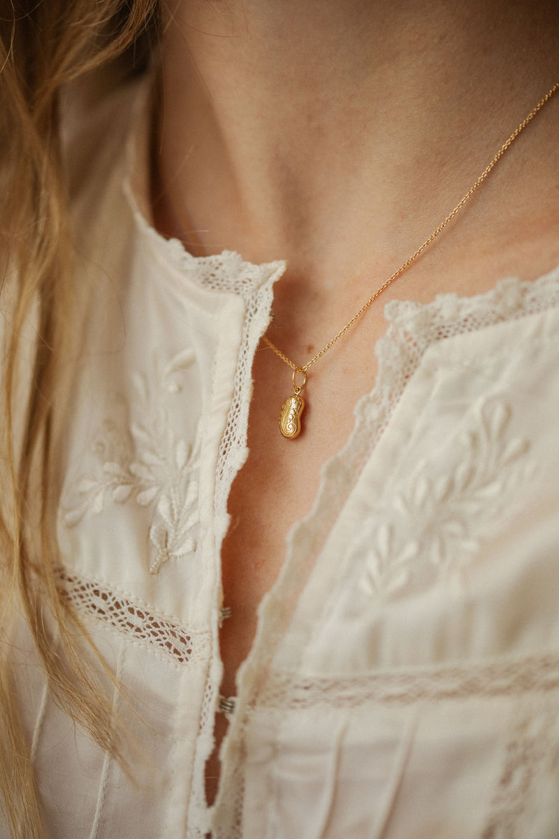 Symbolic designer jewelry gold pendant Myrtille Beck Paris