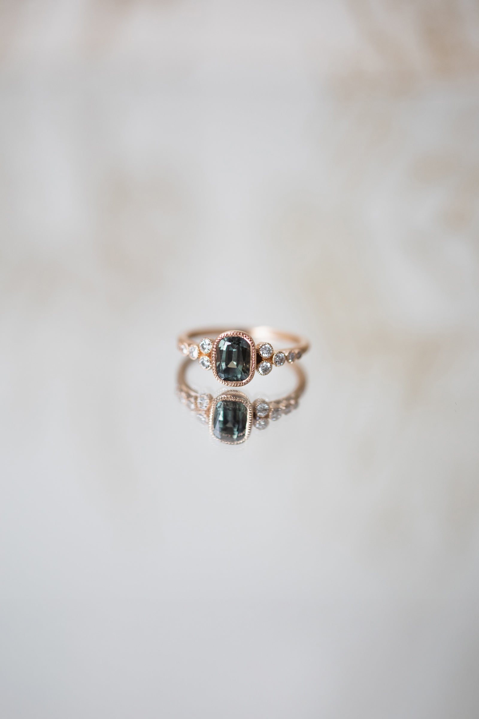 Designer engagement ring Unique piece in gold with natural blue-green umba sapphire and brilliant white diamonds Myrtille Beck