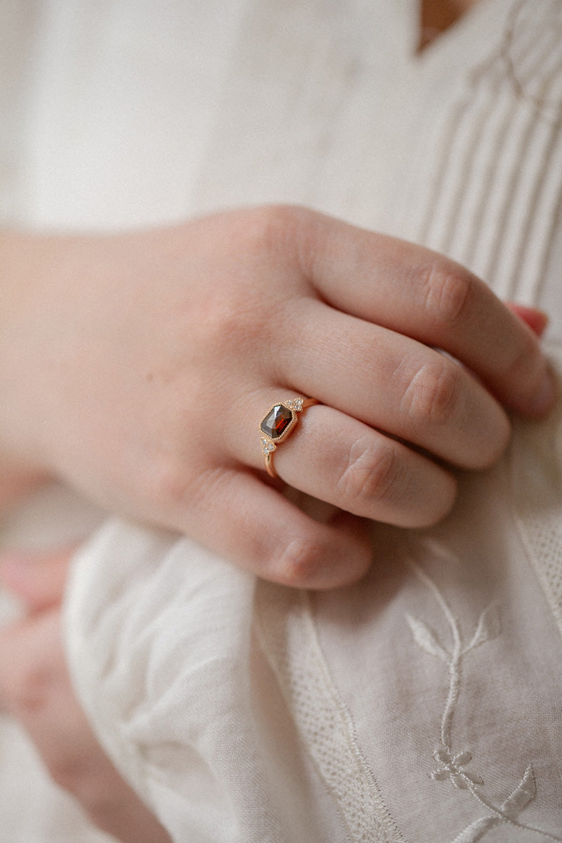 Designer engagement ring: A one-of-a-kind piece in gold featuring diamond rose-cut rectangular diamond with beveled edges and natural white brilliant-cut diamonds by Myrtille Beck