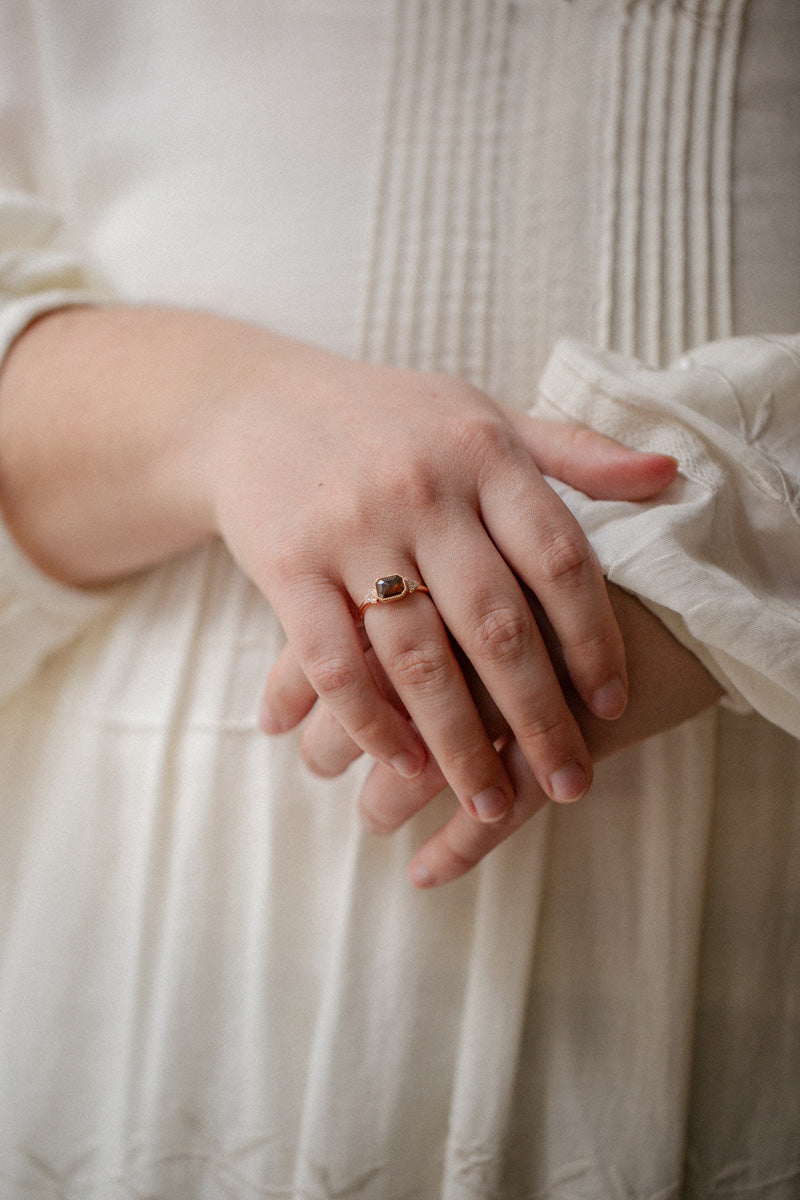 Designer engagement ring: A one-of-a-kind piece in gold featuring diamond rose-cut rectangular diamond with beveled edges and natural white brilliant-cut diamonds by Myrtille Beck