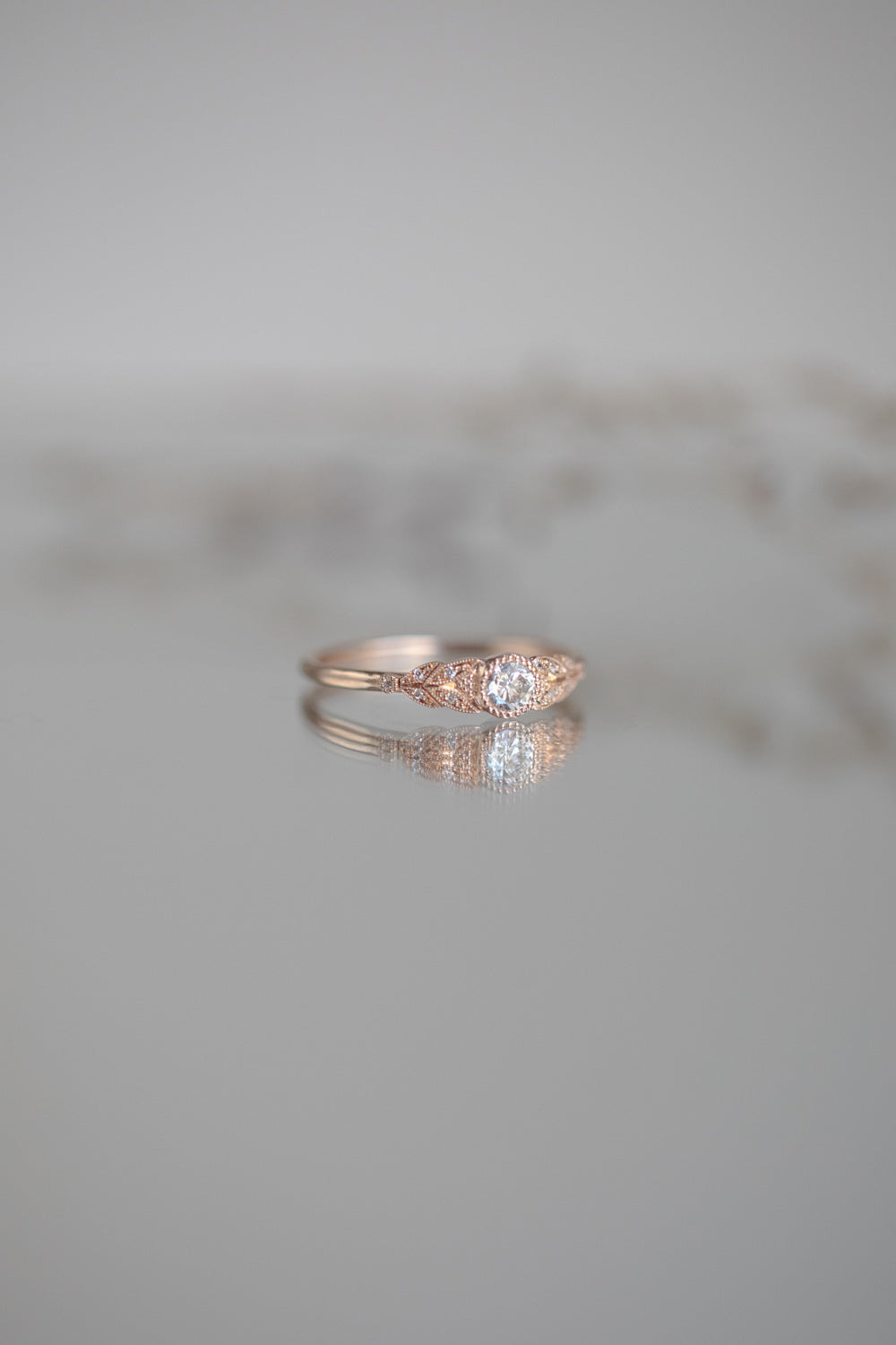 Designer engagement ring in gold with brilliant white diamonds by Myrtille Beck