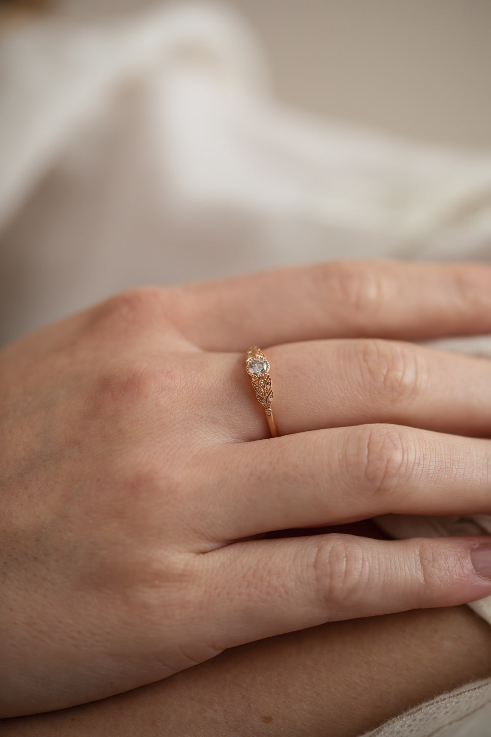 Designer engagement ring in gold with brilliant white diamonds by Myrtille Beck