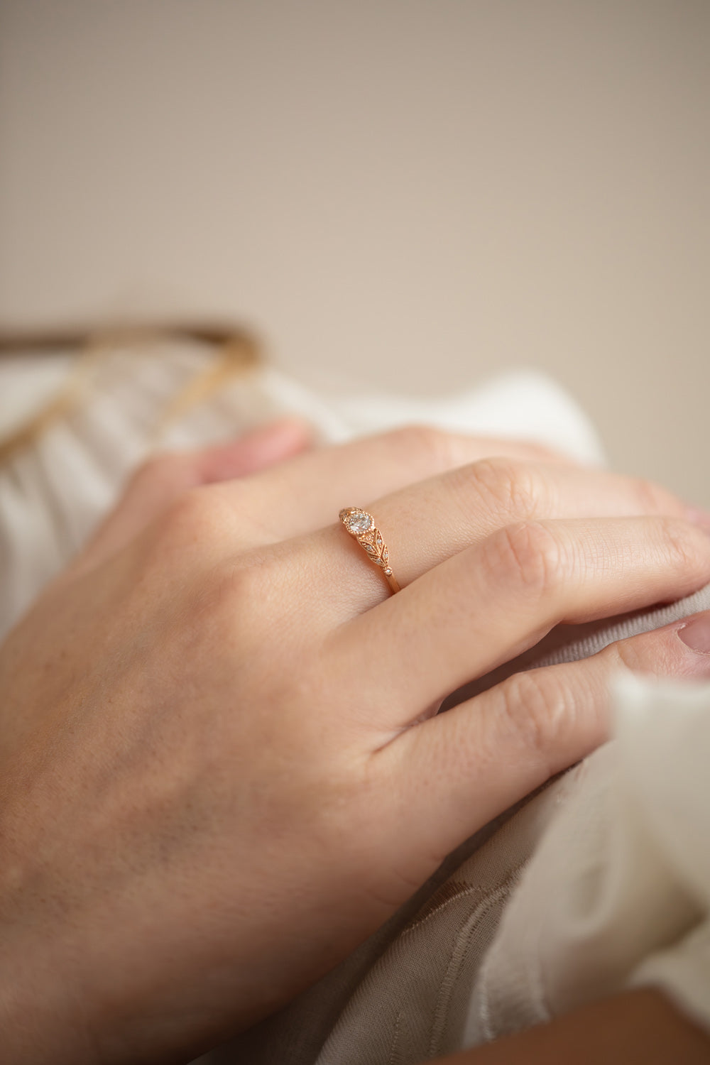 Designer engagement ring in gold with brilliant white diamonds by Myrtille Beck