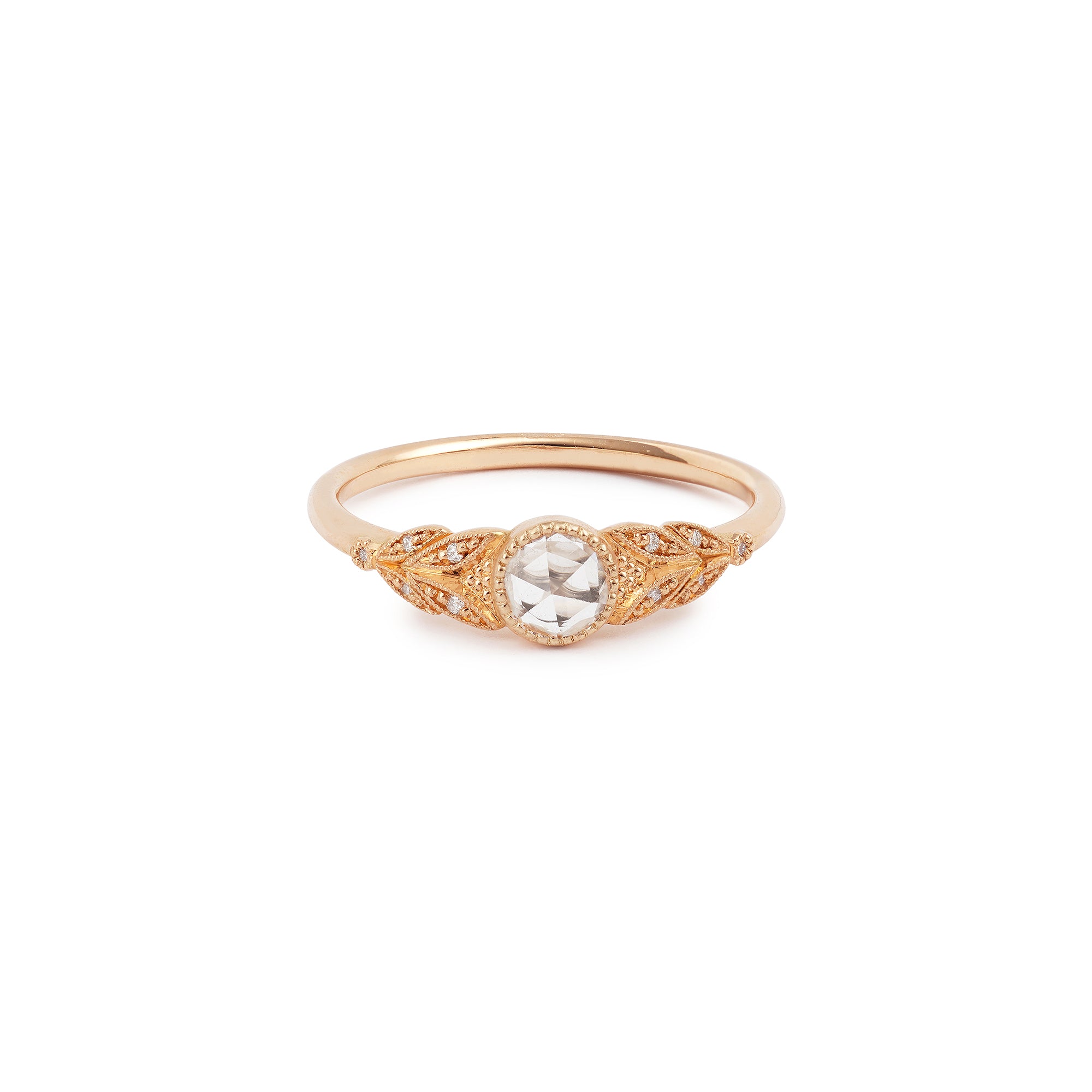 Designer engagement ring in gold with rose-cut white sapphire by Myrtille Beck