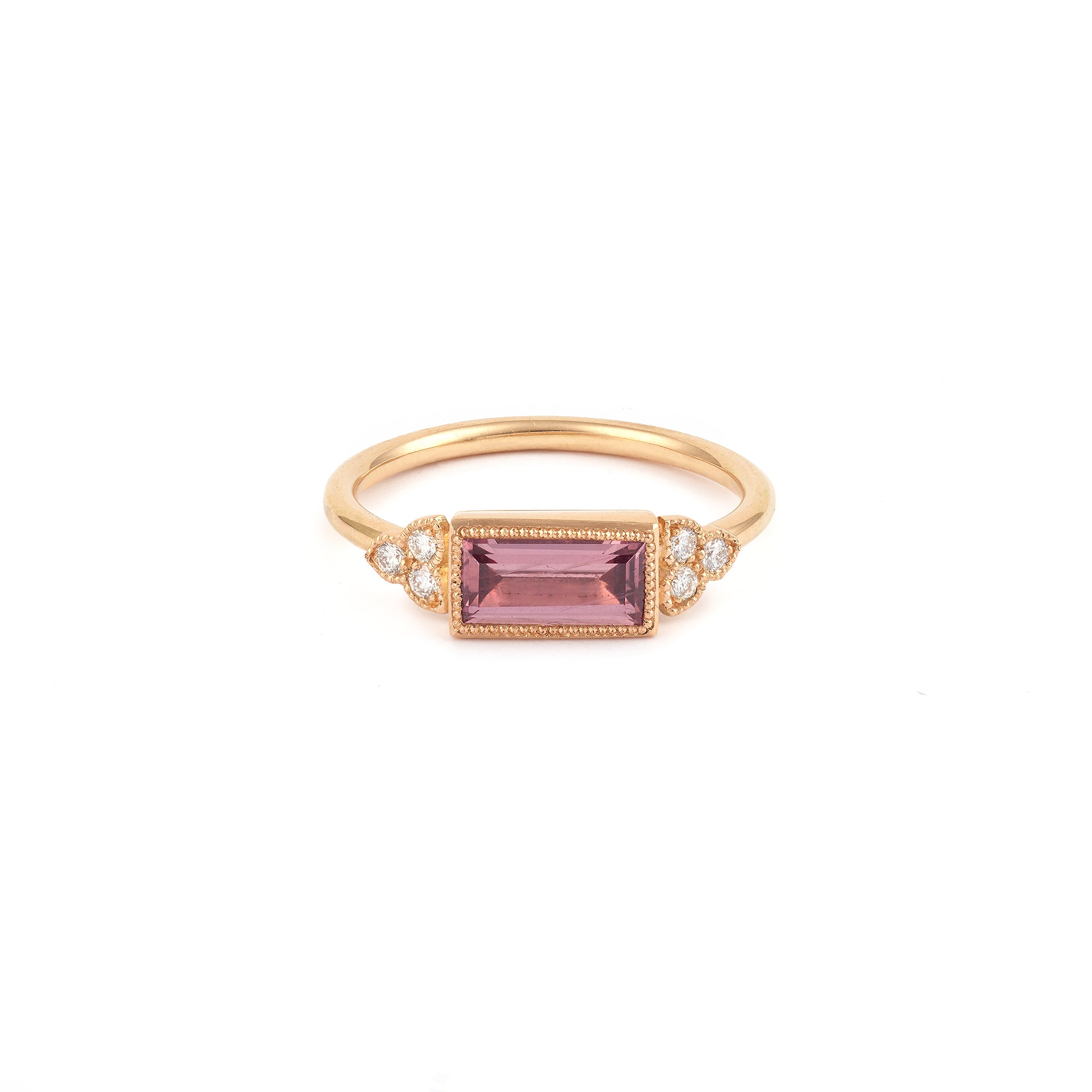 Designer engagement ring: A one-of-a-kind piece in gold featuring a natural Umba pink rectangular sapphire and brilliant-cut white diamonds by Myrtille Beck