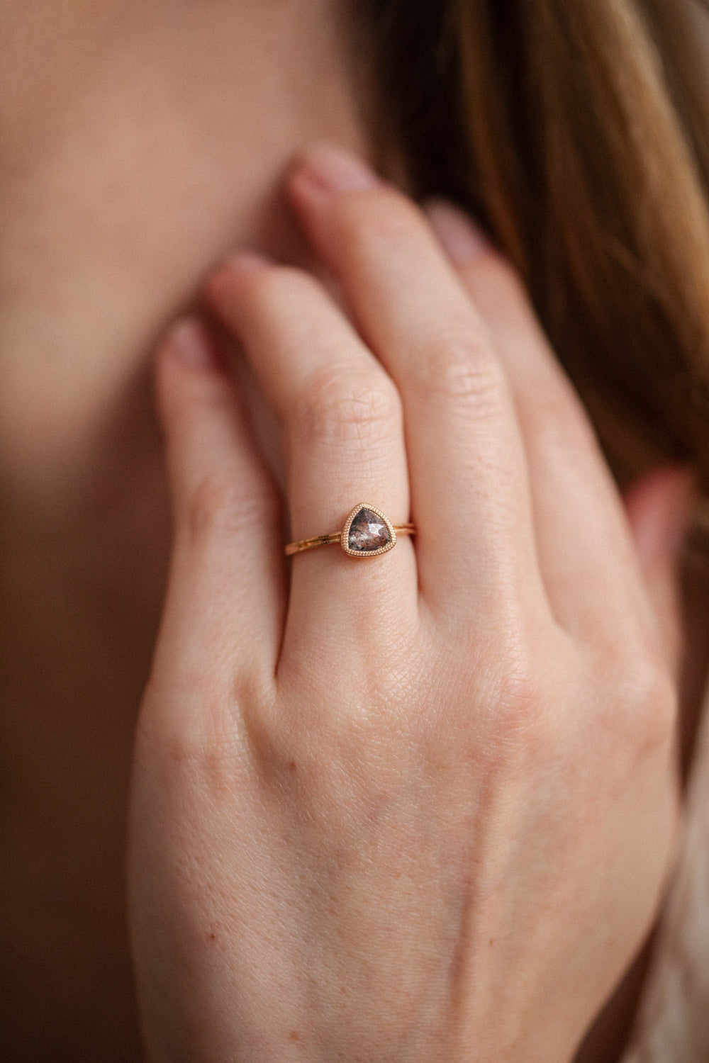 Designer engagement ring in gold diamond and pepper trillion diamond by Myrtille Beck