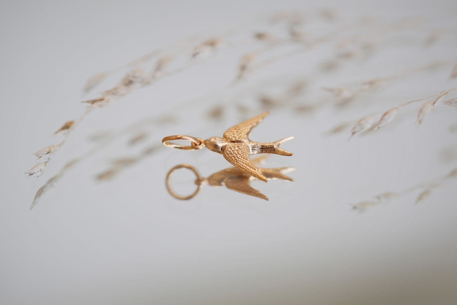 Swallow charm